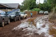 Hawaii's Worst Floods in 20 Years Leave Red Volcanic Mud Coating Homes