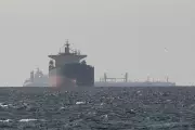 Iranian Drone Attack Ignites Tanker in Dubai Port, Sparking Oil Spill Fears