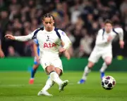 Xavi Simons' Late Penalty Seals Tottenham's 3-2 Victory in Champions League Exit