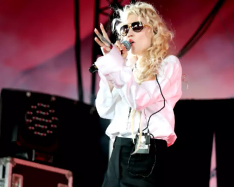 Grimes' LinkedIn Move Sparks Debate on AI Artwashing in Digital Creativity