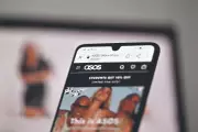 Asos Shares Rise 3% Despite Narrowing Losses and Revenue Decline
