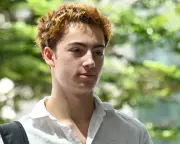 French Teenager Charged in Singapore Over Vending Machine Straw-Licking Video