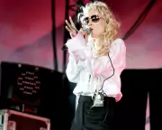 Grimes' LinkedIn Move Sparks Debate on AI Artwashing in Digital Creativity