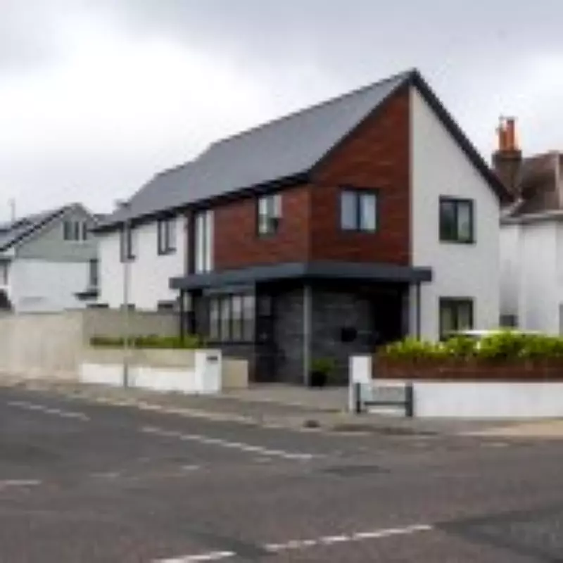 Dorset homeowner builds 7ft concrete 'Berlin Wall' outside £1m home, angers neighbours