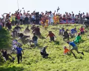 German YouTuber Defeats Local Hero in Gloucestershire Cheese-Rolling Race