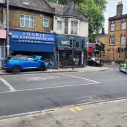 Pedestrian Critical After Car Crashes into Leytonstone Shop, Driver Arrested