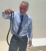 RFK Jr Wrestles Two Snakes in Florida Video, Gets Bitten