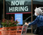 US Economy Adds 115,000 Jobs in April, Beating Expectations
