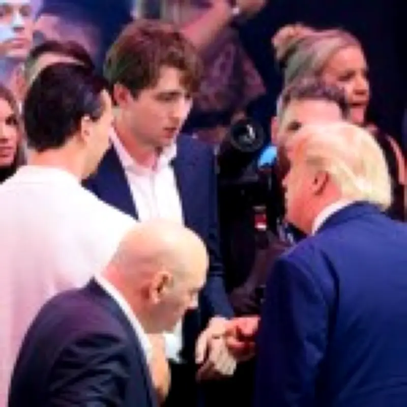 Barron Trump ditches slicked-back hair for laid-back new look at UFC event