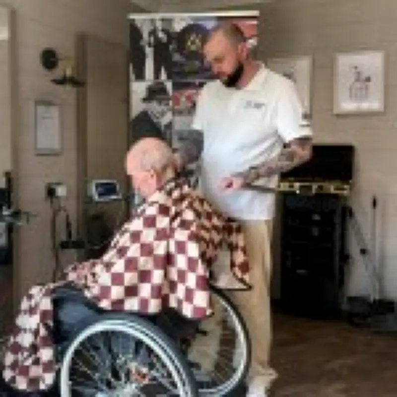 Dementia-friendly barber brings dignity and joy to care home men