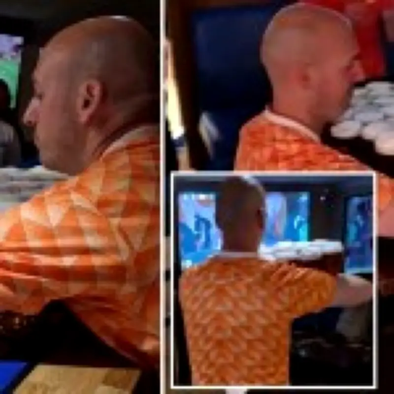 Dutch fan carries 26 pints of beer in one go at Scottish pub
