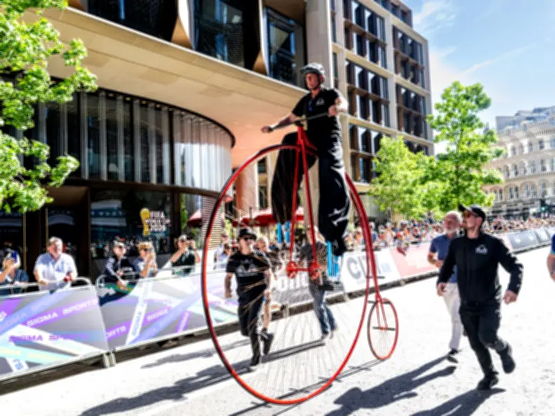 Neil Laughton sets 12th Guinness World Record riding giant penny farthing on stilts in City of London