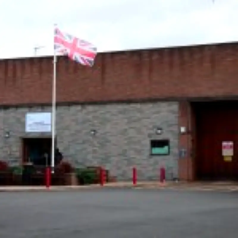 Staff at UK immigration centres wore England flags on uniforms, report reveals