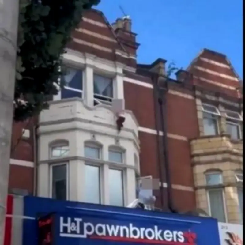 Toddler rescued from ledge above busy Ilford high street in nine minutes