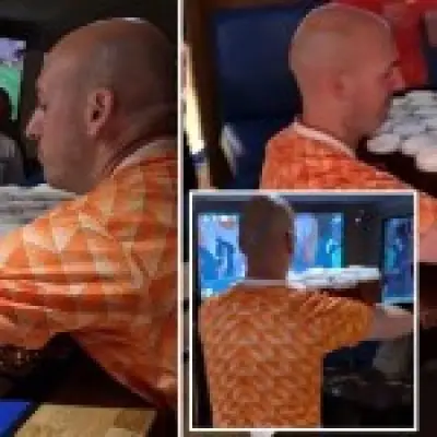 Dutch fan carries 26 pints of beer in one go at Scottish pub