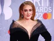 Adele in England jersey at Bad Bunny's historic London stadium gig