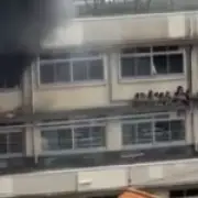 Children cower on ledge as fire engulfs Tokyo elementary school, 10 injured