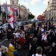 Far-right protest in Belfast turns violent, journalist berated for not taking knee
