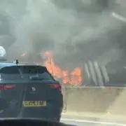 M25 coach fire causes long delays; passengers safe, Surrey Fire Service says