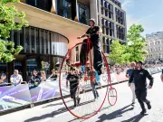 Neil Laughton sets 12th Guinness World Record riding giant penny farthing on stilts in City of London