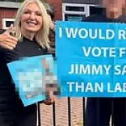 Reform councillor apologises for posing with Jimmy Savile poster