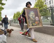 Russian Artist Critical of Putin and Kadyrov Shot Dead in Poland