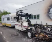 Suspected arson attack on caravans fuels tensions in Glastonbury
