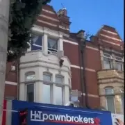 Toddler rescued from ledge above busy Ilford high street in nine minutes