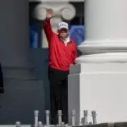 Trump Golfs with Blonde Aide, Tells US to 'Relax' on Iran War