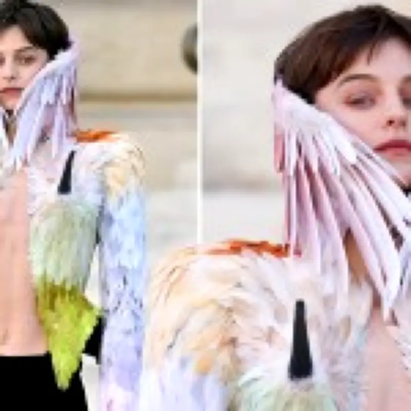 Emma Corrin's Schiaparelli couture jacket with pointed 'nipple' horns steals Paris show